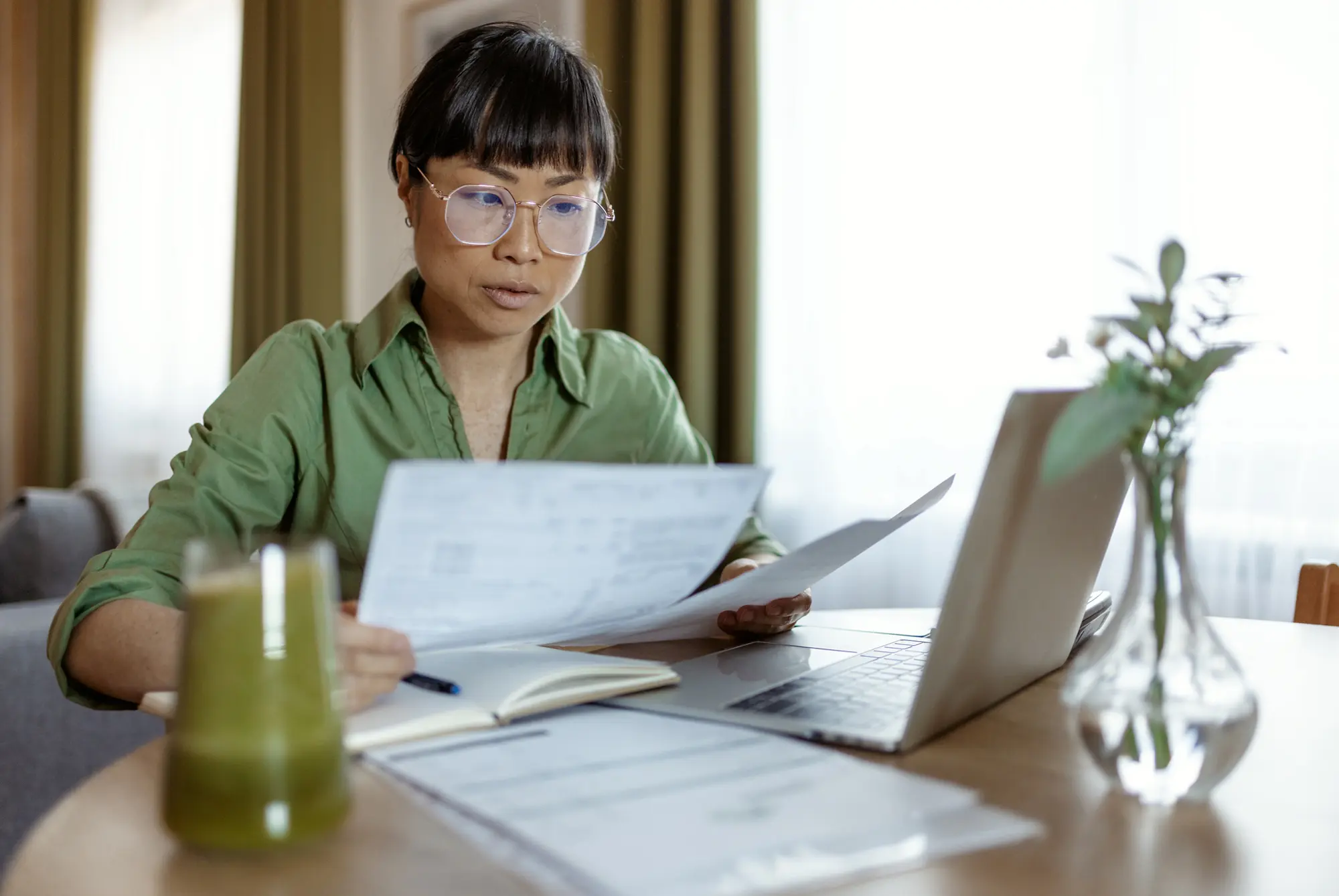 Person reviewing Tax Returns and Other Documents