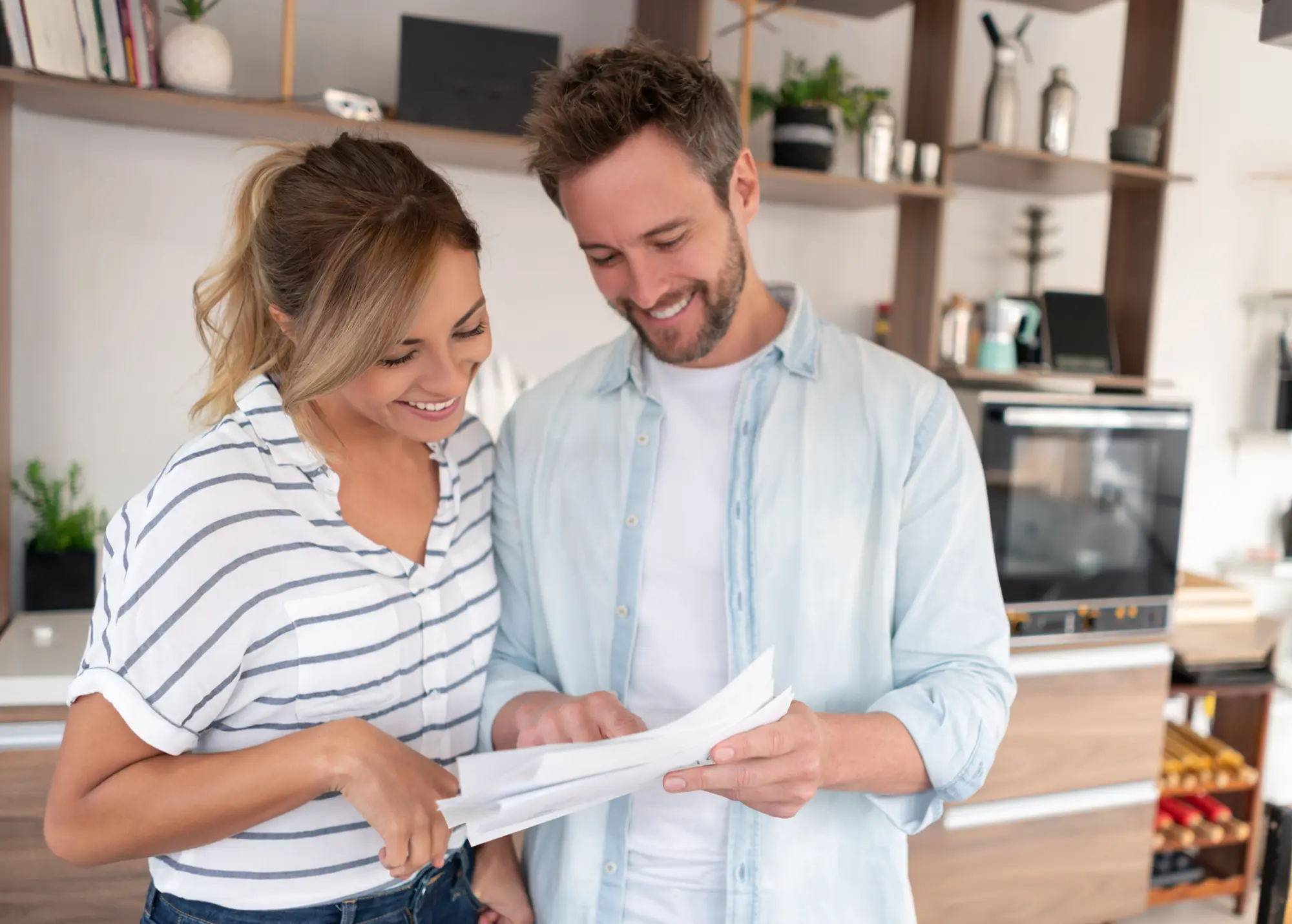 Couple reading about how to successfully manage a major financial windfall