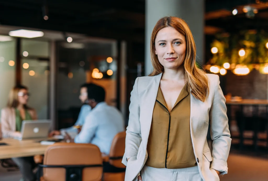 business woman standing in corporate office